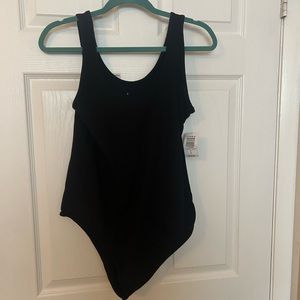 NEW Torrid Body Suit. Torrid Size 0. Size Large. Black body suit.